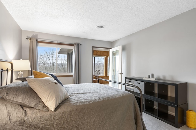 bedroom with a textured ceiling