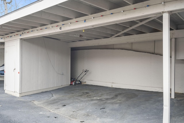 exterior space with a carport