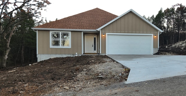 view of front of home with a garage