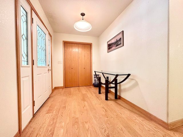 doorway to outside with light hardwood / wood-style flooring