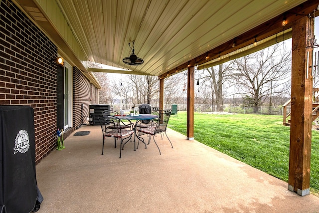 view of patio featuring ceiling fan