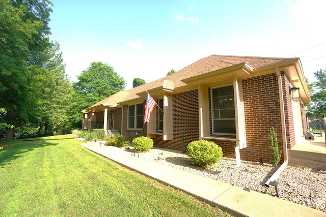 exterior space with a front lawn