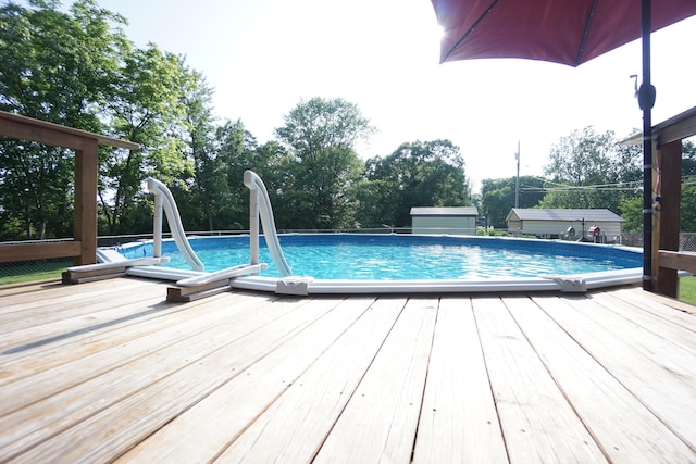 view of pool featuring a deck