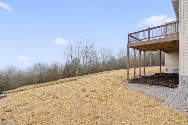 view of yard featuring a deck