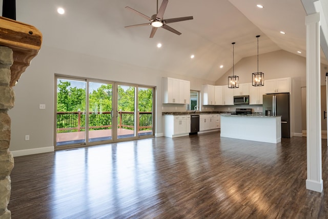 653 Forest Lake Dr, Branson West, MO 65737 - kitchen featuring stainless steel appliances, high vaulted ceiling, open floor plan, ceiling fan, and baseboards
