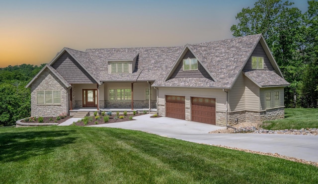 653 Forest Lake Dr, Branson West, MO 65737 - craftsman-style home with stone siding, driveway, a yard, a garage, and a shingled roof