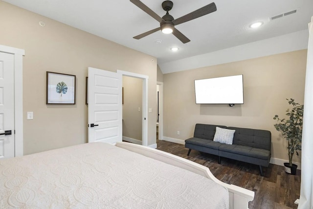 bedroom with dark wood-type flooring and ceiling fan