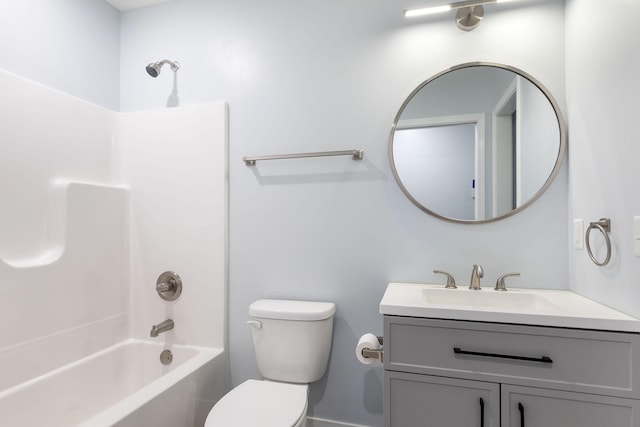 full bathroom with shower / bathtub combination, vanity, and toilet