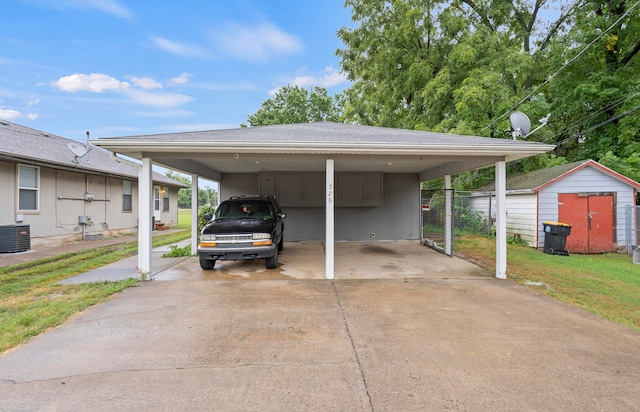 view of parking / parking lot with a carport and a lawn