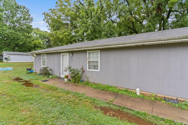 exterior space with a yard