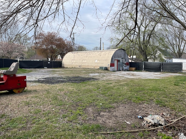 view of yard with a storage shed