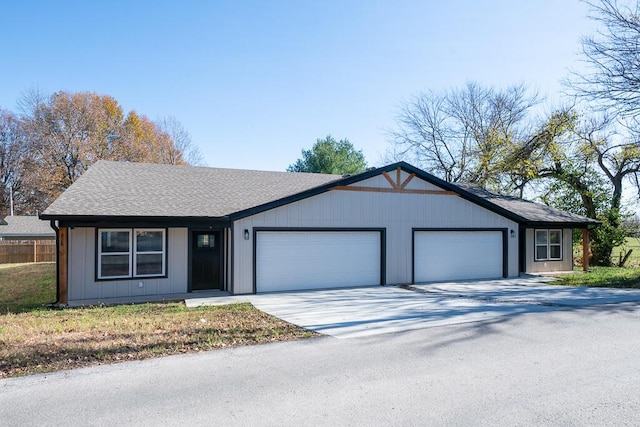 single story home with a garage