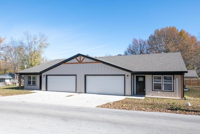 single story home featuring a garage