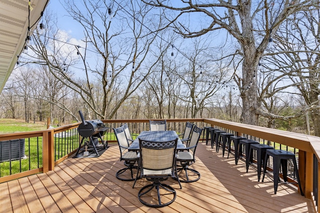 deck featuring a grill