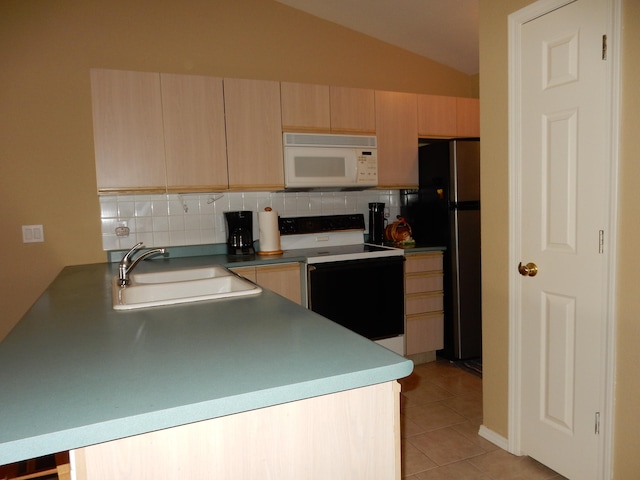 kitchen featuring light brown cabinets, sink, white appliances, and decorative backsplash