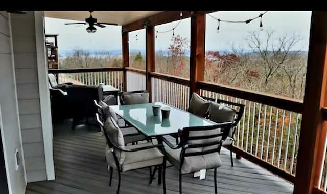 wooden deck with ceiling fan