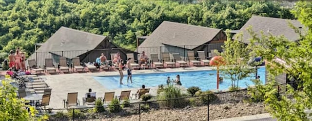 view of swimming pool featuring a patio