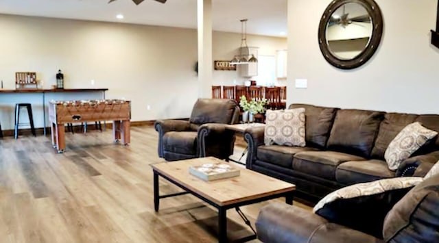 living room with light hardwood / wood-style flooring