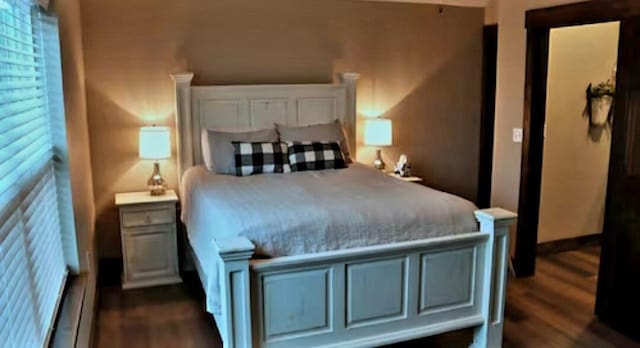 bedroom featuring dark hardwood / wood-style floors