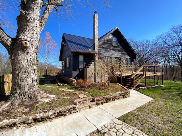 exterior space featuring a yard and a deck