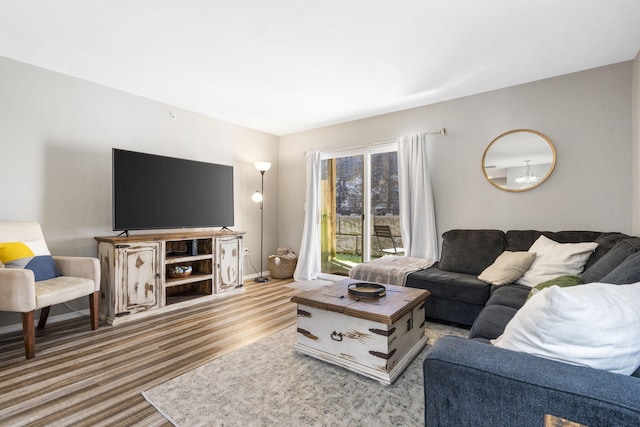 living room with light hardwood / wood-style floors