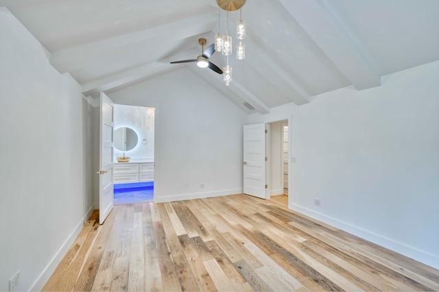 bonus room featuring ceiling fan with notable chandelier, light wood-type flooring, and vaulted ceiling with beams