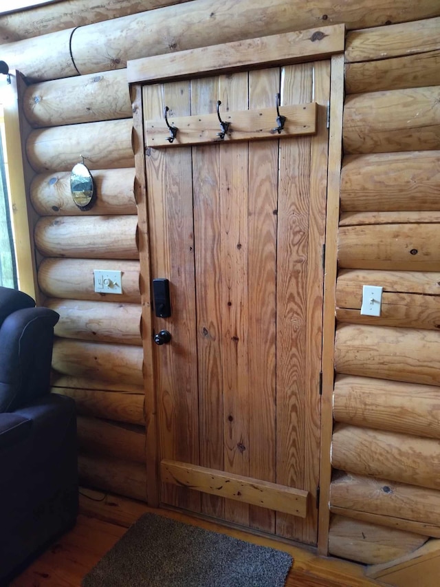 interior details featuring hardwood / wood-style floors