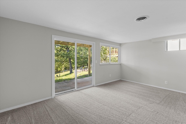 empty room featuring carpet floors