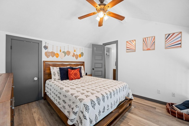 9 Scenic Ct Unit 9-9, Branson, MO 65616 - bedroom with lofted ceiling, baseboards, a ceiling fan, and wood finished floors