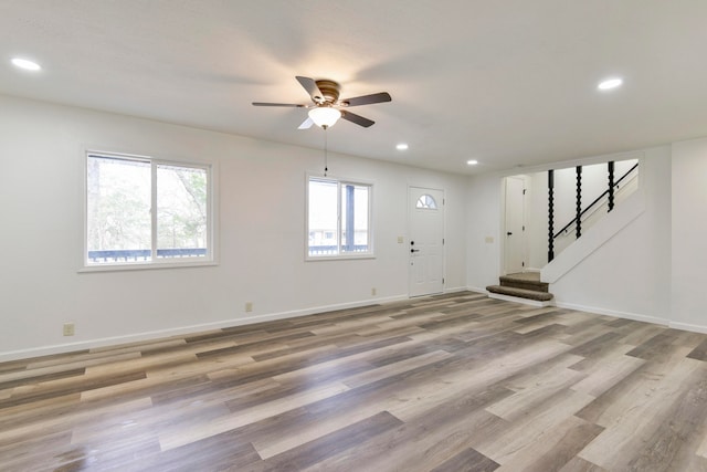 interior space featuring ceiling fan and light hardwood / wood-style floors