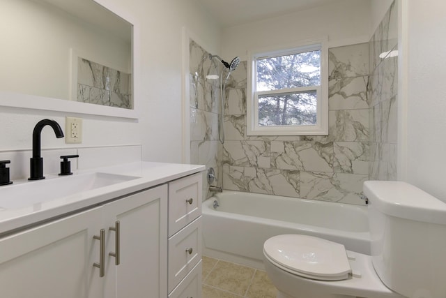 full bath with tile patterned floors, vanity, shower / tub combination, and toilet