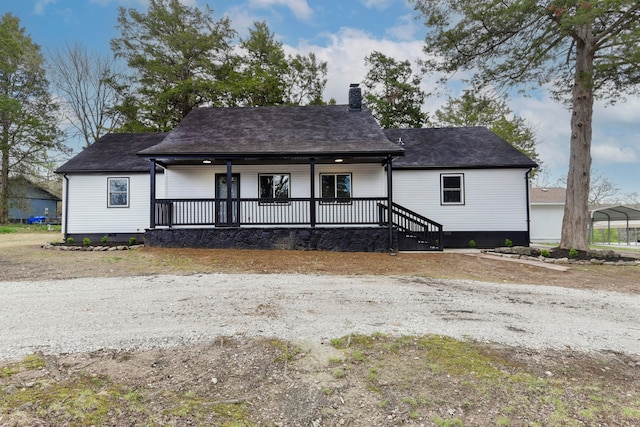 view of front of house with a carport