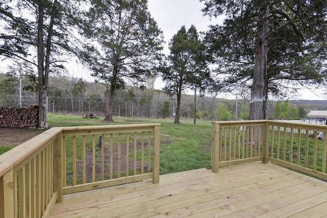 wooden deck with a yard