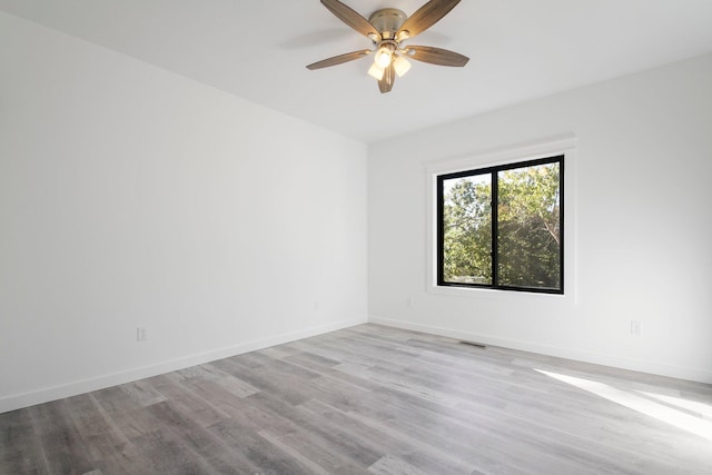 000 State Route Jj, West Plains, MO 65775 - empty room featuring wood finished floors, baseboards, and ceiling fan