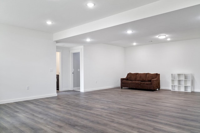 living area with hardwood / wood-style floors