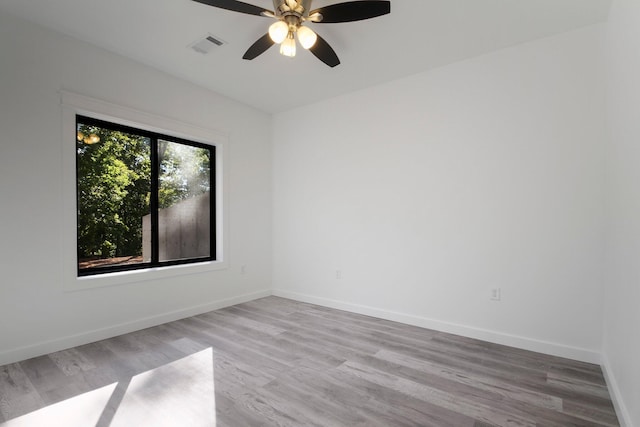 000 State Route Jj, West Plains, MO 65775 - spare room with ceiling fan, baseboards, visible vents, and light wood-type flooring