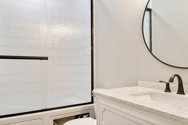 000 State Route Jj, West Plains, MO 65775 - bathroom featuring toilet, vanity, and shower / washtub combination