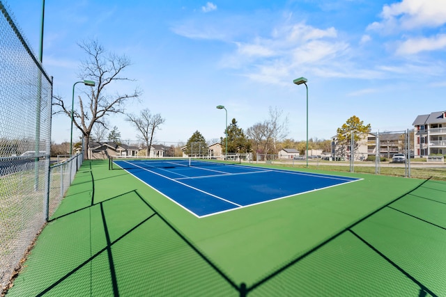 view of sport court featuring basketball court