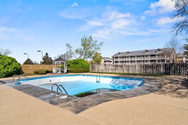 view of swimming pool with a gazebo