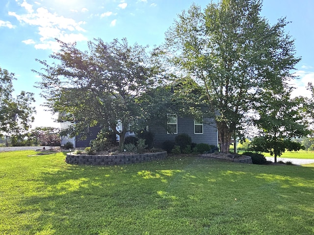 view of front of home with a front yard