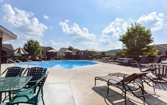 view of pool with a patio area