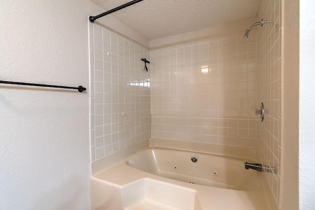 150 Sunken Forest Dr Unit 10-242, Forsyth, MO 65653 - full bath with a textured wall, a textured ceiling, and a combined bath / shower with jetted tub