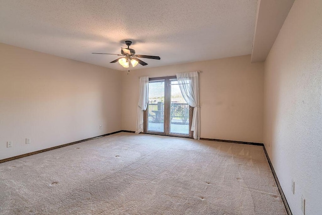 150 Sunken Forest Dr Unit 10-242, Forsyth, MO 65653 - carpeted spare room featuring ceiling fan, baseboards, and a textured ceiling