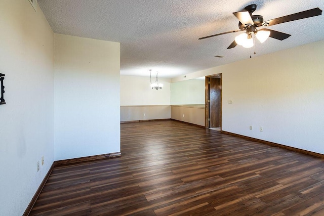 150 Sunken Forest Dr Unit 10-242, Forsyth, MO 65653 - empty room featuring baseboards, wood finished floors, a textured ceiling, and ceiling fan with notable chandelier