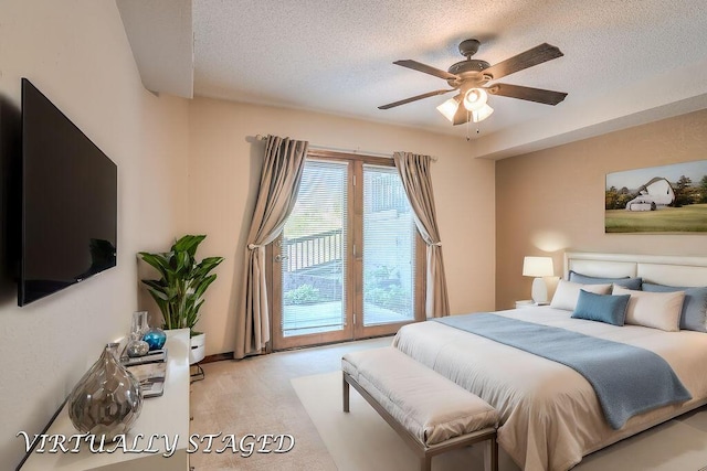 150 Sunken Forest Dr Unit 10-242, Forsyth, MO 65653 - bedroom with a ceiling fan, carpet flooring, and a textured ceiling