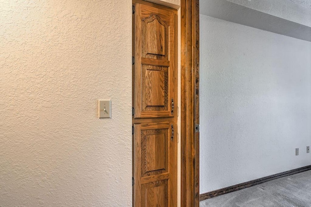 150 Sunken Forest Dr Unit 10-242, Forsyth, MO 65653 - interior details with a textured wall, baseboards, and carpet