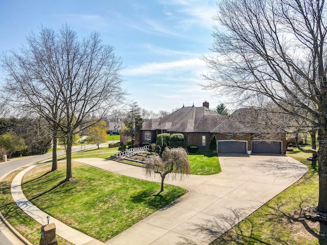 exterior space with a lawn and a garage