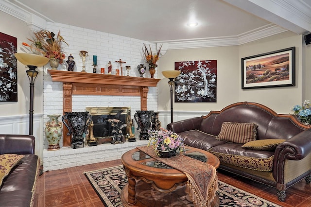 living room with a brick fireplace and ornamental molding