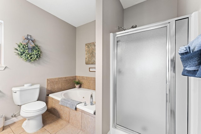 280 Tina St Unit 9, Hollister, MO 65672 - bathroom featuring a bath, tile patterned floors, a stall shower, and toilet