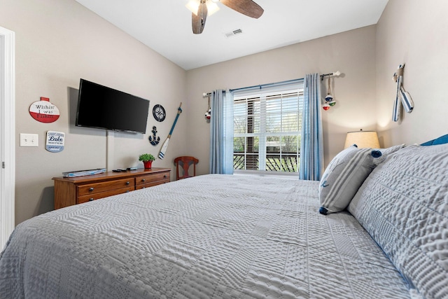 280 Tina St Unit 9, Hollister, MO 65672 - bedroom with a ceiling fan, visible vents, and access to outside